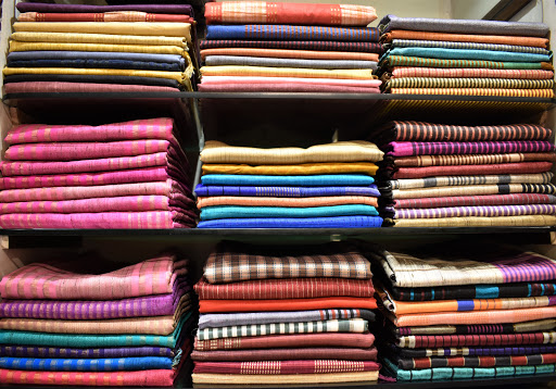 Dwarkadheesh Emporium - Best Sarees , Unstitched Suits & Fabrics , Silk, Khadi, Cotton store in Dwarka ramphal chowk