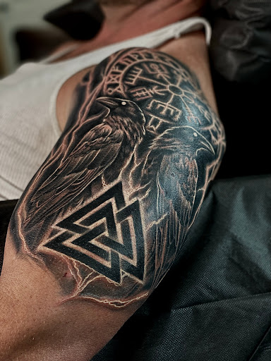 Explore kiss band tattoo ideas, creative tattoo ideas in Galena, available at Studio C Tattoo