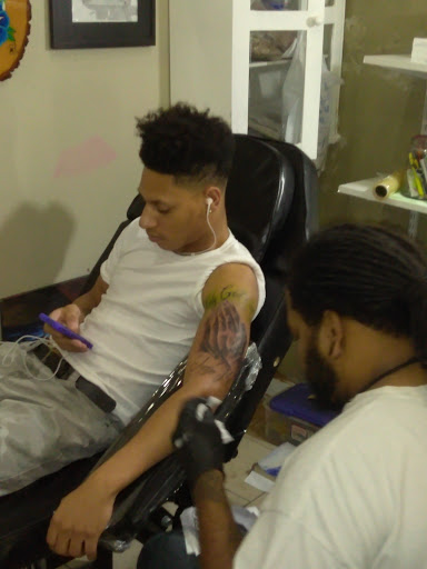 Explore neck tattoo ideas, creative tattoo ideas in Atlanta, available at Iron Palm Tattoos & Body Piercing Atlanta