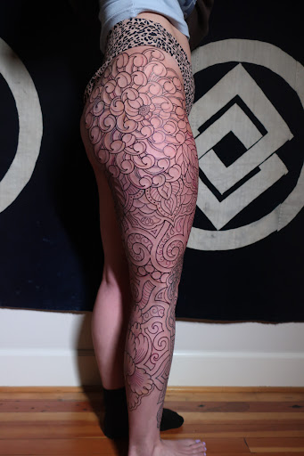 Explore full neck tattoo ideas, creative tattoo ideas in Austin, available at Black Swan Tattoo Company