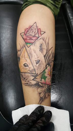 Find small cat tattoo ideas for your next unique tattoo in Fresno at Happy Client Tattoo