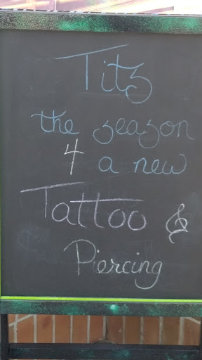 Tattoo Shop «Tit 4 Tat Tattoo Studio Inc.», reviews and photos, 45571 Mound Rd, Shelby Charter Township, MI 48317, USA