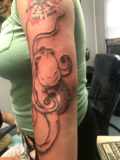 Explore omerta tattoo ideas, creative tattoo ideas in Muncie, available at The Tattoo Studio