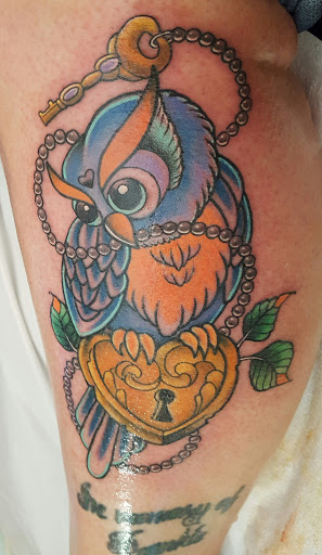 Explore men's inner bicep tattoo ideas, creative tattoo ideas in Kingsford, available at Deft Tattoo Studio