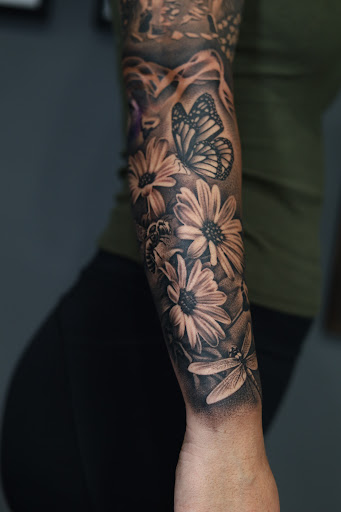 Explore mom and son tattoo ideas, creative tattoo ideas in Southfield, available at Enki Tattoo
