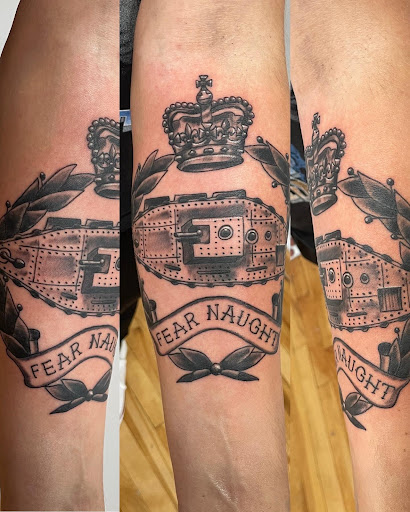 Explore money bag tattoo ideas, creative tattoo ideas in Kansas City, available at Golden Stag Tattoo and Gallery