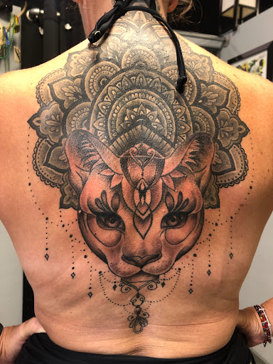 Explore broken heart tattoo ideas for guys, creative tattoo ideas in Englewood, available at Point of Entry Tattoo