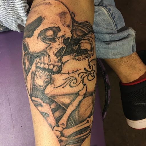 Explore mens western tattoo ideas, creative tattoo ideas in Cleveland, available at Tattoo Cafe