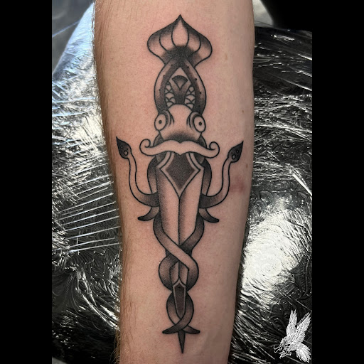 Explore tattoo letters ideas, creative tattoo ideas in Fayetteville, available at Sacred Raven Tattoo Shop