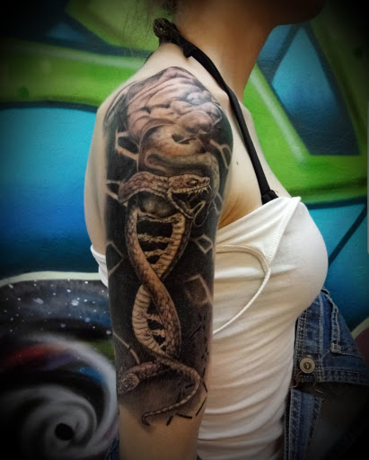 Explore tattoo full sleeve ideas, creative tattoo ideas in Ambler, available at Tattoo GalaxyAmbler Piercing & Custom Tattoos
