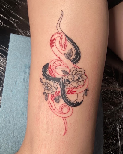 Explore color flower tattoo ideas, creative tattoo ideas in Baldwin, available at Moonlight Gallery