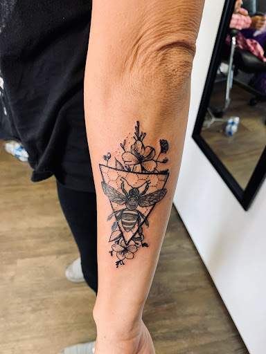 Explore boyfriend name tattoo ideas for girlfriend, creative tattoo ideas in Lake City, available at Crooked Spines Tattoo Studio