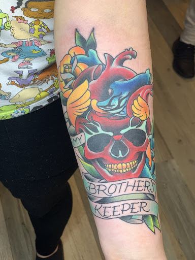 Explore good tattoo cover up ideas, creative tattoo ideas in Powell, available at Hummingbird Tattoo Studio