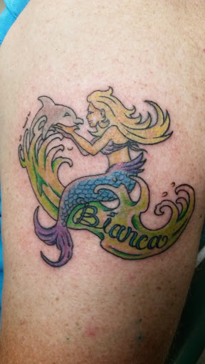 Find tattoos in between breast ideas for your next unique tattoo in Hilo at Pacific Island Ink