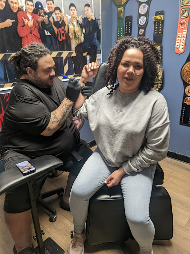 Explore family flower tattoo ideas, creative tattoo ideas in Elyria, available at Chronic Tattoo