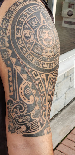 Explore annabelle tattoo ideas, creative tattoo ideas in Winter Haven, available at Angry Elephant Tattoos Winter Haven
