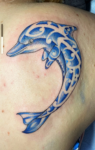 Explore hand tattoo ideas for guys, creative tattoo ideas in Saint Augustine, available at Ms. Deborahs Fountain of Youth Tattoo & Body Piercing