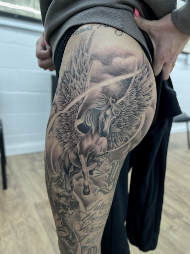 Explore colorful flower tattoo ideas, creative tattoo ideas in Stanton, available at Eclectic Art & Tattoo