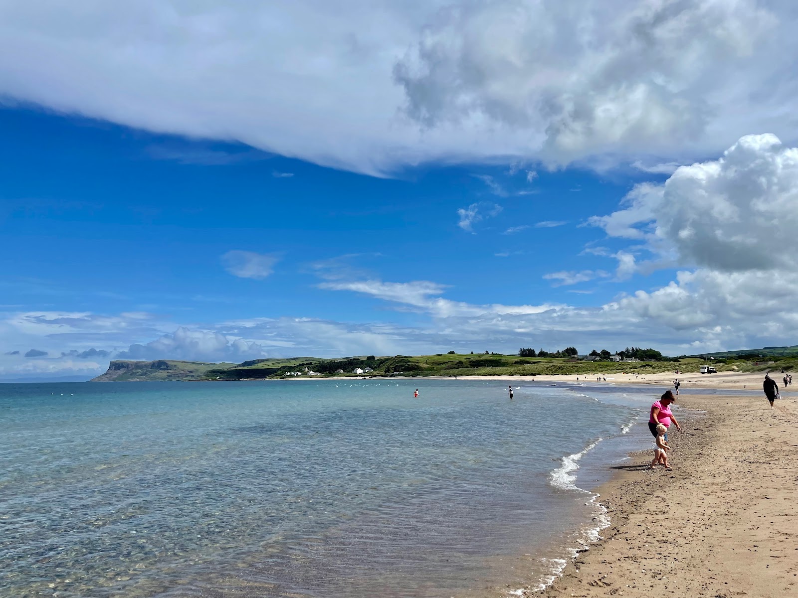 Photo of Ballycastle Beach with turquoise pure water surface