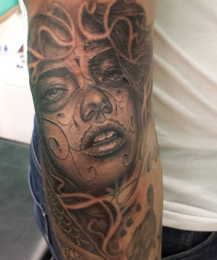 Explore calf tattoo ideas men, creative tattoo ideas in Atlanta, available at Golden Anchor Tattoo