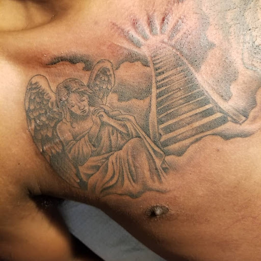 Explore fist tattoo ideas, creative tattoo ideas in Keyport, available at Taboo Tattoos