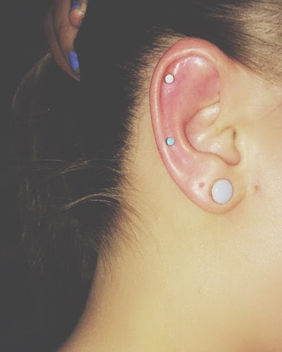 Explore sleeve tattoo idea, creative tattoo ideas in Charleston, available at MOLA Piercing and Fine Jewelry