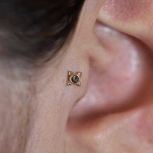 Explore fourth wing tattoo ideas, creative tattoo ideas in Montpelier, available at Marigold Adornment Tattoo, Piercing, & Jewelry.