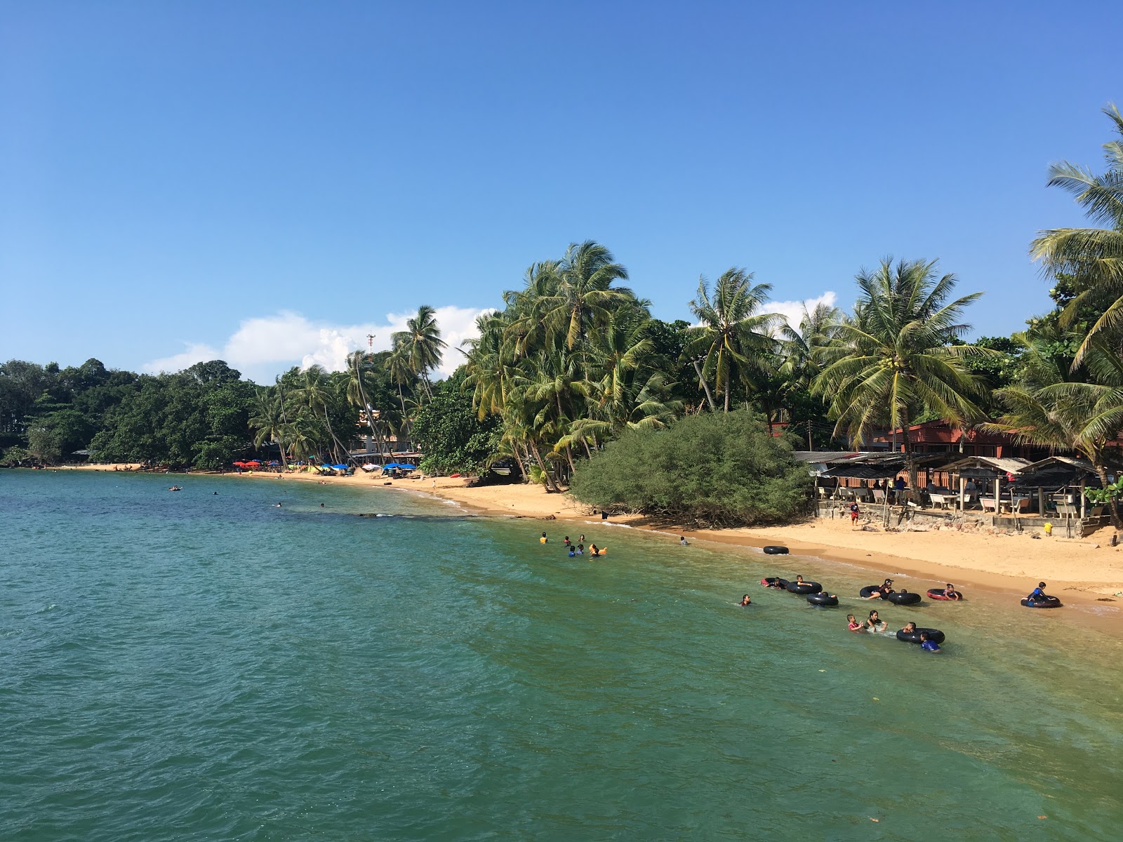 Photo of Ao Tan Khu Beach with turquoise pure water surface