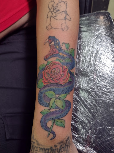 Explore atlantis tattoo ideas, creative tattoo ideas in Owosso, available at Twisted ink tattoo