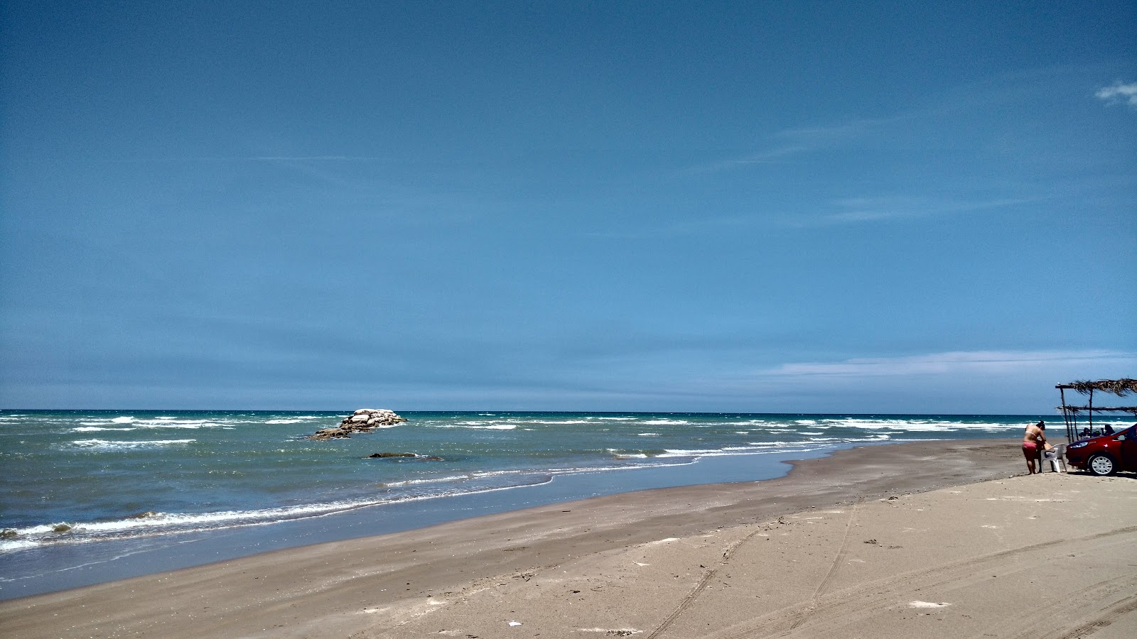 Foto de Playa Paraiso con arena brillante superficie
