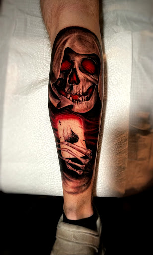 Explore neck and shoulder tattoo ideas, creative tattoo ideas in Johnson City, available at Gold Cross Tattoo Co.