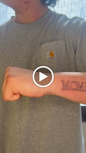 Explore lip tattoo cover up ideas, creative tattoo ideas in Orange, available at Top Floor Tattoo Studio