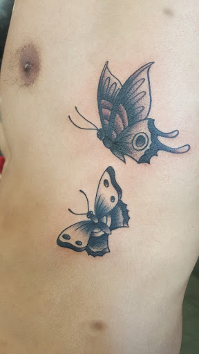 Explore feminine cover up tattoo ideas, creative tattoo ideas in Bakersfield, available at CLASSIC STANDARD TATTOO CO.