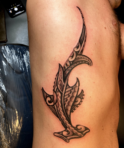 Explore spine tattoo ideas for men, creative tattoo ideas in Sarasota, available at Z-Edge Tattoo & Body Piercing South Shop