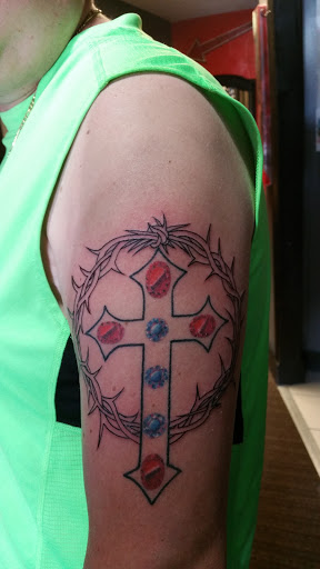 Explore tattoo ideas behind the ear, creative tattoo ideas in Foley, available at Black Sheep Custom Tattoos and Piercings