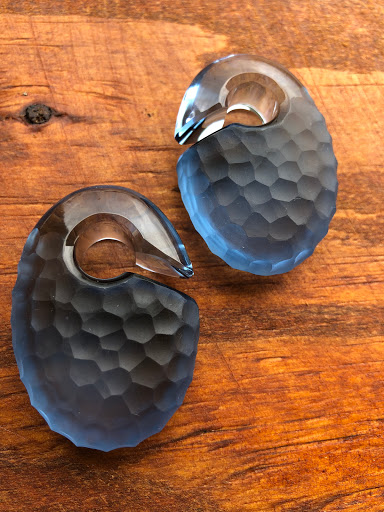 Explore small ear tattoo ideas, creative tattoo ideas in Orlando, available at Drift Piercing Studios