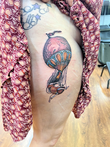 Explore dawn tattoo ideas, creative tattoo ideas in Cocoa, available at Rorschach Tattoo Shop and Piercing Studio