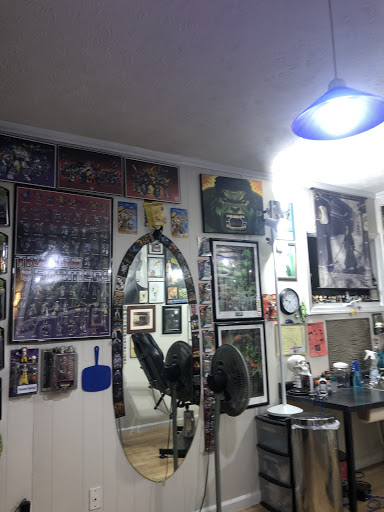 Explore haunted house tattoo ideas, creative tattoo ideas in Muncie, available at The Tattoo Studio