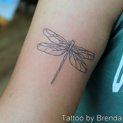 Explore neck tattoo ideas, creative tattoo ideas in Fort Myers, available at Tiger Lotus Tattoo and Piercing