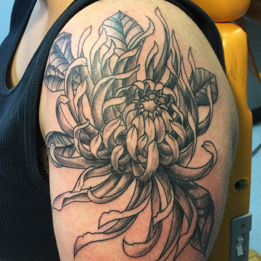 Find tattoo ideas with letters for your next unique tattoo in Brunswick at Blue Fin Tattoos