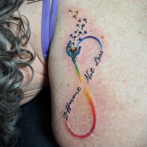 Explore simple fish tattoo ideas, creative tattoo ideas in Medina, available at Art In Motion Inc Tattooing