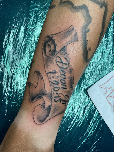 Explore tattoo cuff ideas, creative tattoo ideas in Loveland, available at Single Needle Tattoo