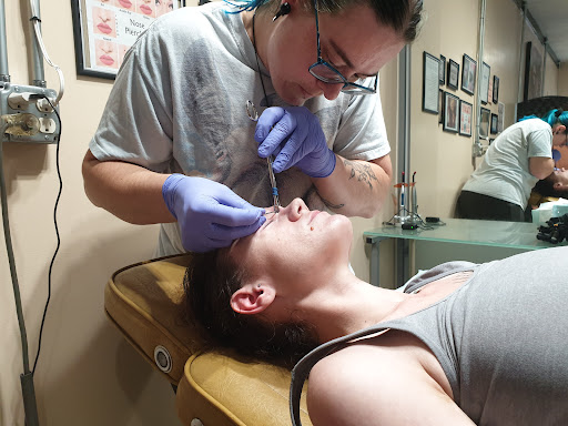 Explore tattoo ideas for lost brother, creative tattoo ideas in Endicott, available at Distortion Piercings & Polish