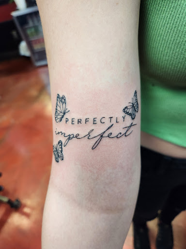 Explore dragon tattoo ideas for ladies, creative tattoo ideas in Inverness, available at The Perfect Spot Tattoos