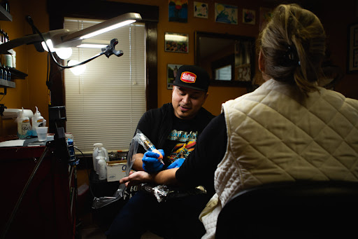 Explore small moon tattoo ideas, creative tattoo ideas in Canton, available at The Inkeepers Tattoo Parlor