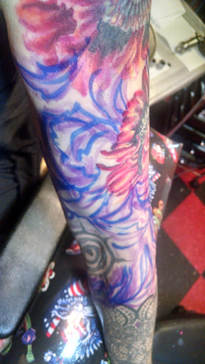 Explore tattoo ideas for female thigh, creative tattoo ideas in Greenfield, available at Pygmalions Tattoo