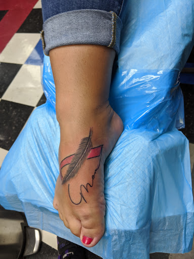 Tattoo Shop «Artistry In Motion», reviews and photos, 230 E Walnut St, North Vernon, IN 47265, USA