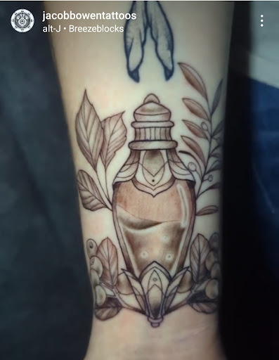 Explore santa tattoo ideas, creative tattoo ideas in Buford, available at Inked Arts Tattoo Studio