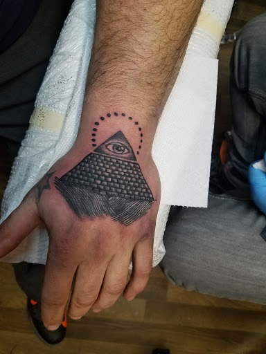 Tattoo Shop «Traditions Elite Tattoo Piercing and Gallery», reviews and photos, 403 W Lackawanna Ave, Olyphant, PA 18447, USA