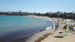 Foto di Playa de las Cucharas con baia spaziosa